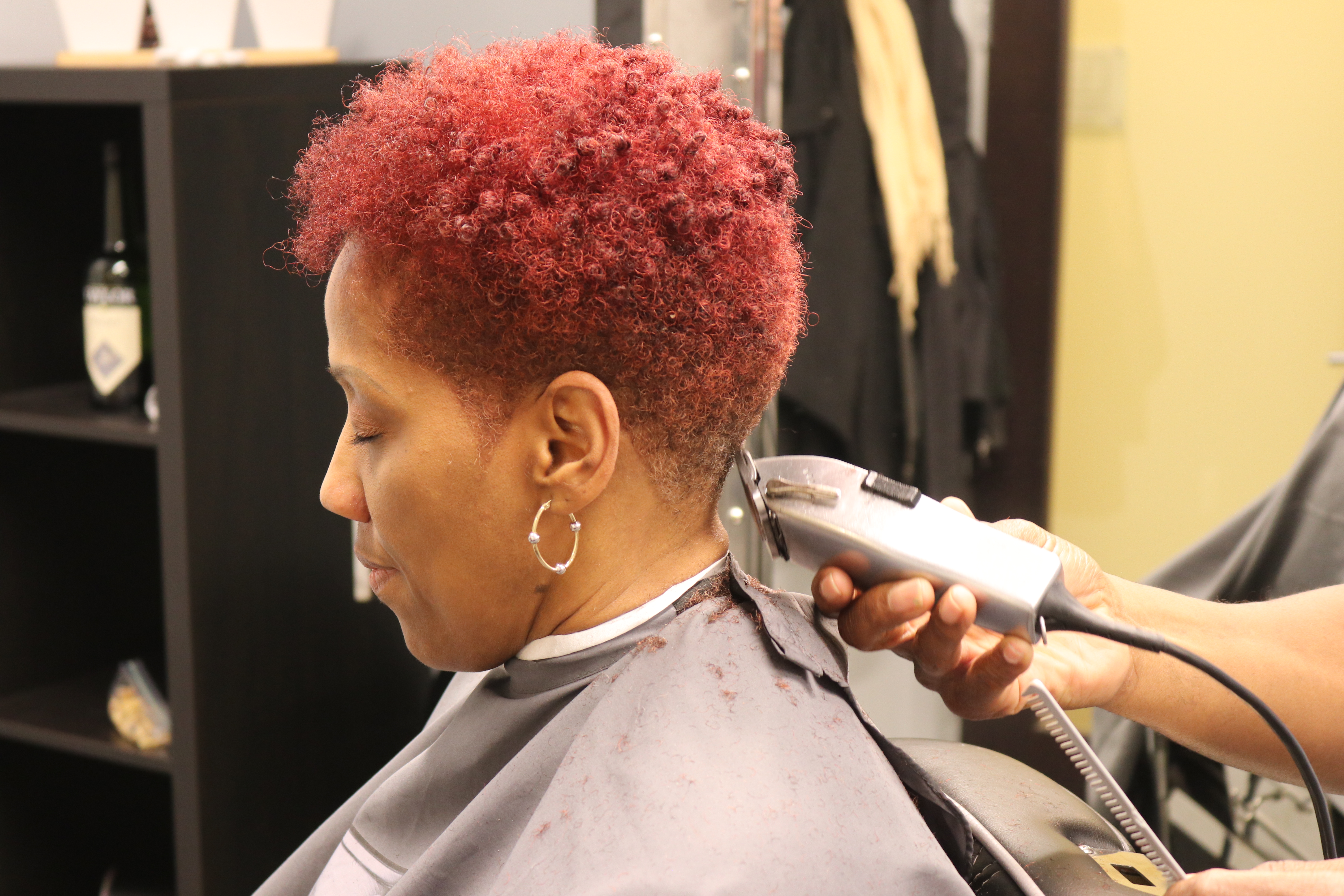 Natural haircut. neck taper. curly. color.