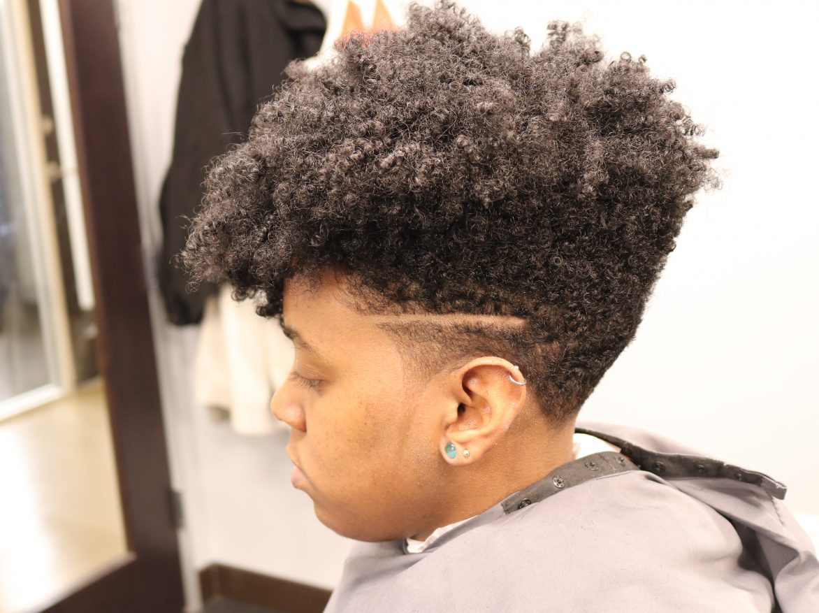 Curly black woman fade haircut