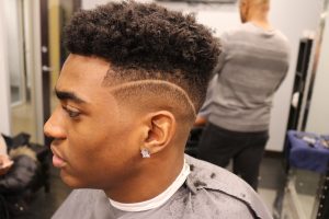 Design Haircut fade with part