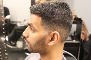 Combover haircut with part